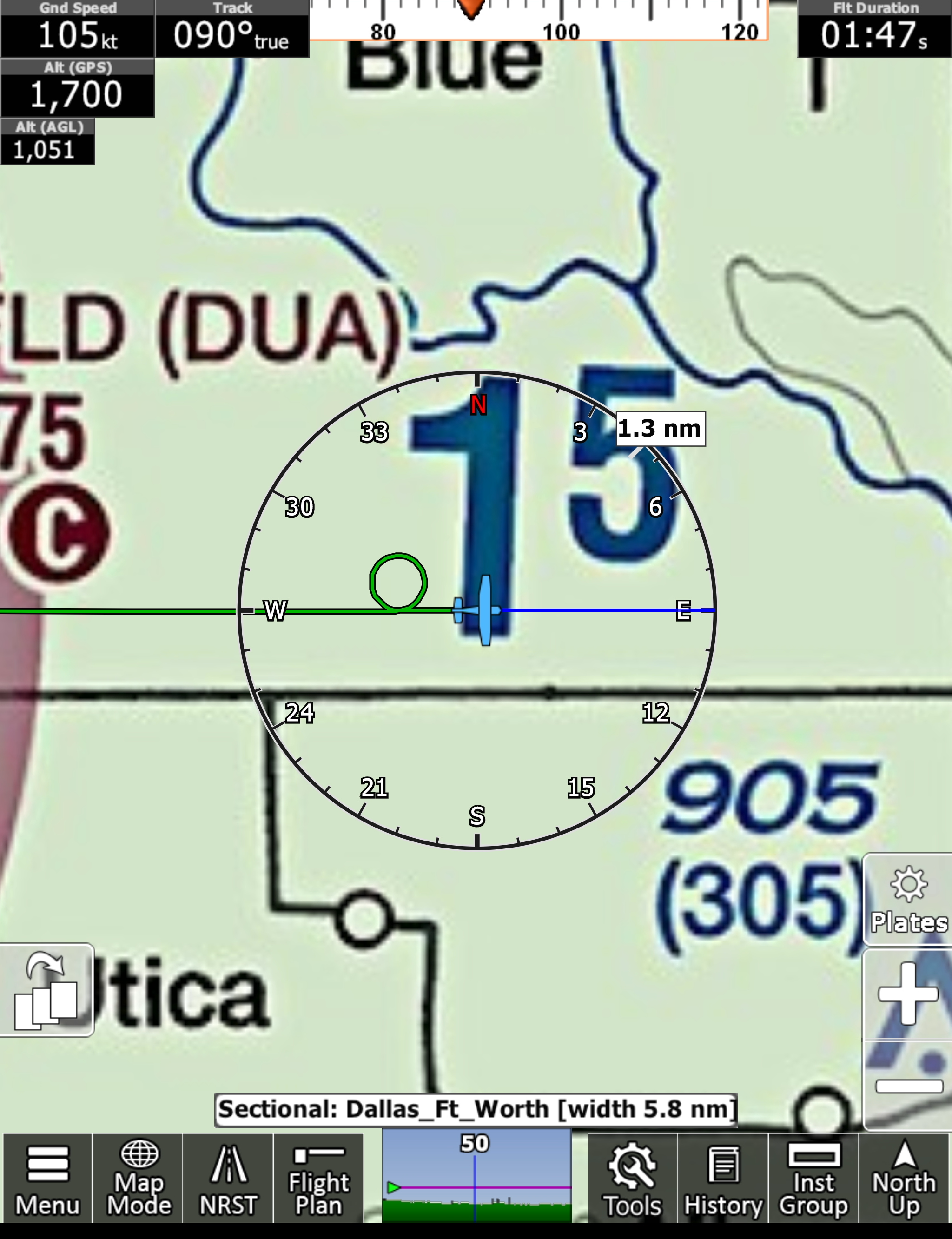 Instructor and student reviewing a recorded flight trail on a tablet